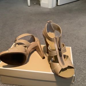 Michael Kors Berkeley TStap 3” heels with front zipper.